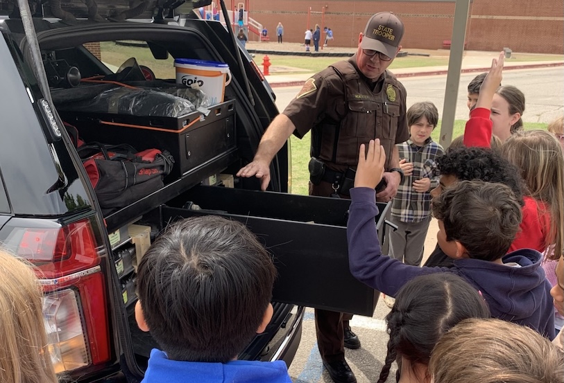 Oklahoma Highway Patrol troopers visit elementary students for safety education and community outreach