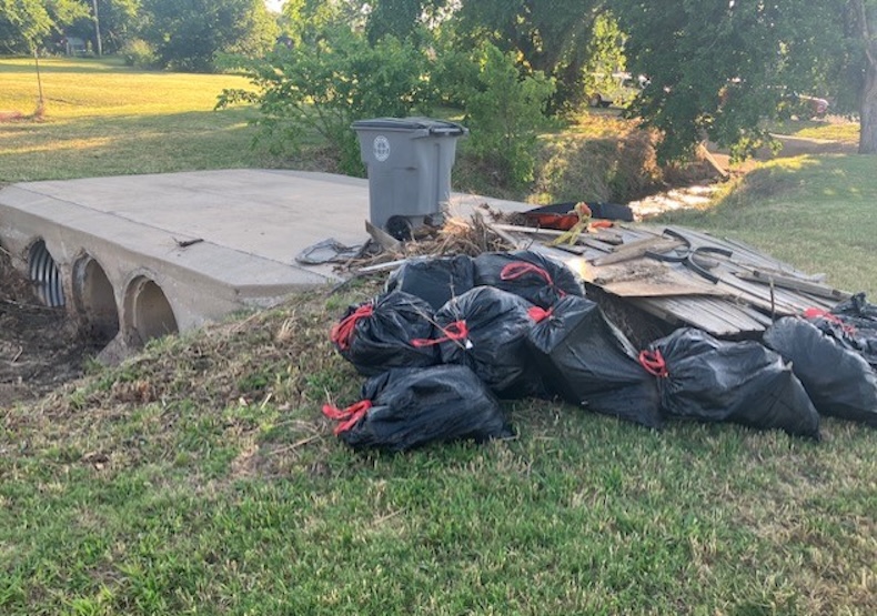 Volunteers remove 680 pounds of trash from Numu Creek during Stream Clean Saturday in major cleanup effort